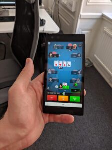 Cubeia Poker displayed in portrait mode on a smartphone